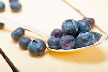 fresh blueberry on silver spoon