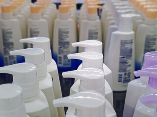 Rows of Plastic Shampoo Bottles with Pumping Cap