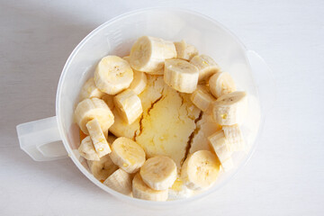 Ingredients in the cooking bowl: bananas, cottage cheese, honey