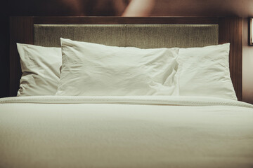 Fototapeta na wymiar Comfortable Modern Hotel Bed