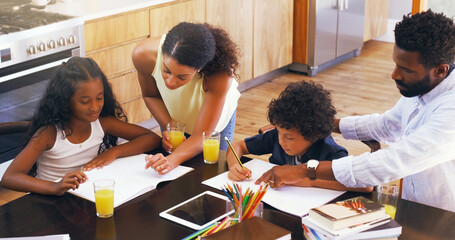 Play an active role in your childs homework. Cropped shot of parents helping their two children with their schoolwork at home.