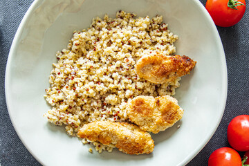 porridge bulgur quinoa breaded chicken breadcrumbs baked poultry meat fresh healthy meal food snack diet on the table copy space food background rustic top view