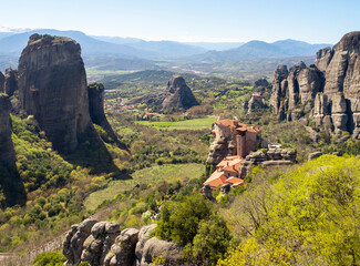 Fototapeta na wymiar Panoramic view of the Meteora Mountains and the Rusanou Monastery from the observation deck in Greece