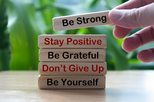 Self-help motivational text on wooden blocks - Motivation concept