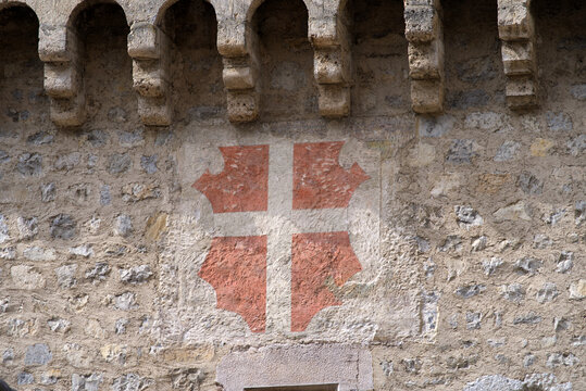 Famous medieval Chillon Castle at border of Lake Geneva on a blue cloudy spring day. Photo taken April 4th, 2022, Veytauy-Chillon, Switzerland.