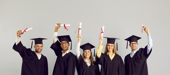 Congrats, grad. Happy proud international multiracial multiethnic college or university students in...