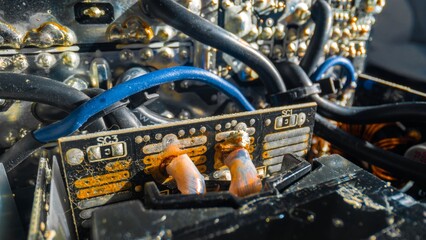 Closeup photo of damaged circuit board - 498987528
