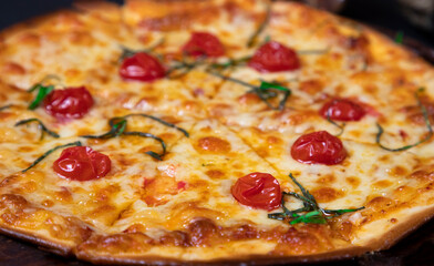 Delicious Pizza on the plate with mozzarella cheese and cherry tomato | Cafe Food 