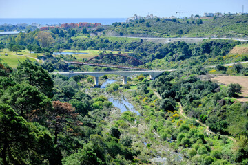 Views of the Guadalmina River and the Mediterranean Sea from a viewpoint