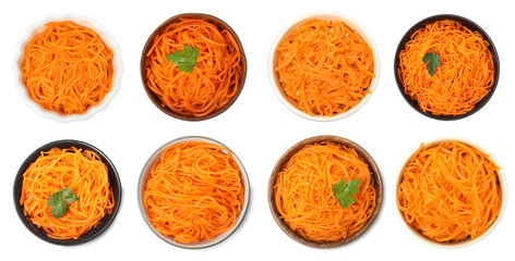 Set with tasty Korean carrot salad on white background, top view. Banner design