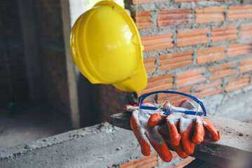 Safety helmet (hard hat) and Dirty Protective Glove, glasses for engineer, safety officer, or...