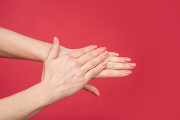 female hands with manicure and smooth skin