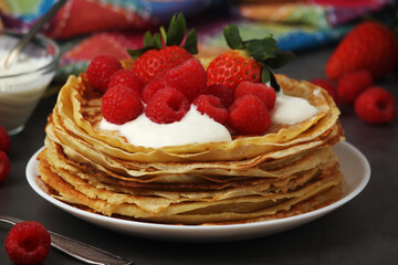 Russian cuisine national dish bliny with fresh berries