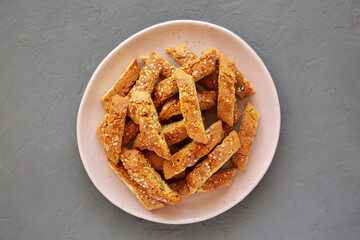 Homemade Italian Cantuccini with Pistachios and Citron on a Plate, top view. Crispy Pistachio and Citron Cookies. Flat lay, overhead, from above.