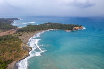 Aerial view of Phaselis (ruins of ancient harbour town) and  Mediterranean coastline. Beydaglari Coastal National Park, Antalya Province, Turkey.