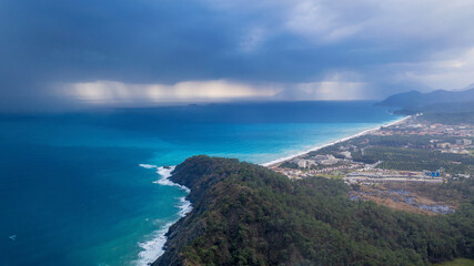 Fototapeta premium Thunderstorm obove Tekiriva town and Mediterranean Sea. Beydaglari Coastal National Park, Antalya Province, Turkey.