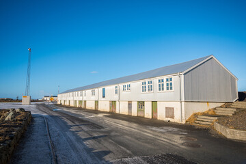 Old renovated warehouses near the port of Hofn in Hornafjordur in Iceland