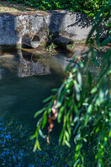 Discharge of polluted water into the river. Nature in danger.