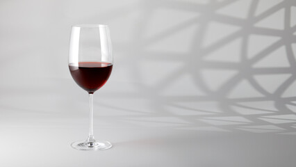 Glass of red wine isolated on white background, copy space