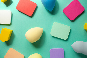 Top view of different cosmetics sponges,all types and forms.Good as cosmetic background.