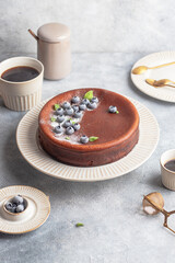 chocolate cottage cheese casserole with blueberry and mint .leaves