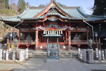 Fototapeta premium Izuna Gongen-do hall of Takao-san Yakuo-in temple, Tokyo, Japan