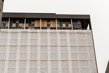 Oslo, Norway - July 22 2012: Boarded up windows at Regjeringskvartalet after the 2011 bombing.