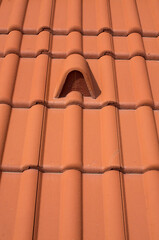 New concrete hooded vent tile pvc spigot on roof close