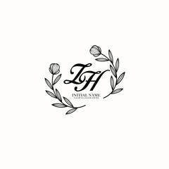 Fototapeta premium ZH Initial letter handwriting and signature logo. Beauty vector initial logo .Fashion boutique floral and botanical