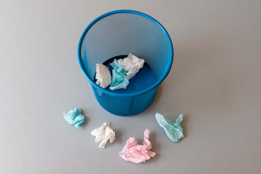 Throw Away Tissue Paper In And Out Side Of Trash Bin