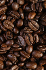 Top view of the texture of roasted ready-to-drink coffee. Scene of coffee beans. Black ground coffee