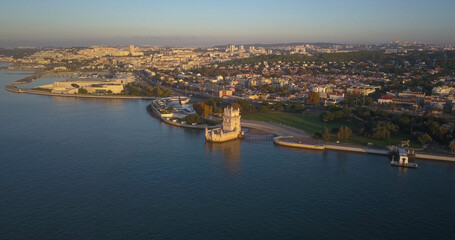 Fototapeta na wymiar Tower of Belém in a huge sunrise