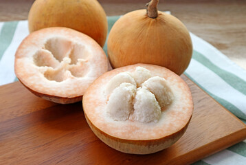 Closeup an Opened Sweet and Sour Fresh Ripe Cotton Fruit or Santol Fruit