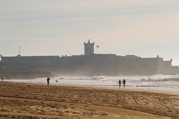 castle of saint Julian with some fog behind