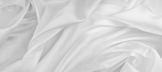 Close-up of rippled white silk fabric texture - obrazy, fototapety, plakaty