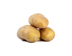A bunch of unpeeled raw potatoes on a white background.