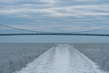 The Verrazano Narrows Bridge connecting Staten Island to Brooklyn as seen from New York Harbor.   