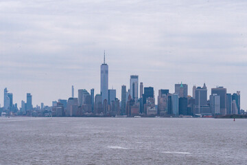 The Freedom Tower and the buildings of lower Manhattan financial district downtown as seen from New York Harbor