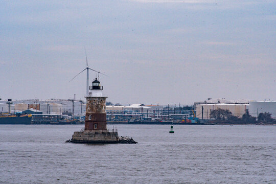 The Robbins Reef Lighthouse in New York Harbor between Jersey City, Manhattan and Staten Island