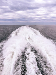 Hydrofoil Ferry Wake and overcast clouds on a spring day.