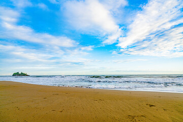 Sunrise at Playa Cocles, beautiful tropical Caribbean beach, Puerto Viejo, Costa Rica east coast and island Cocles