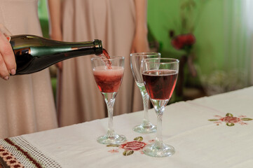 Glasses of red sparkling wine on the table. serving wine