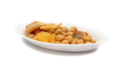 Food widely consumed at Easter, in Spain, chickpeas with cod. Isolated on white background. Spanish traditional foods.