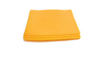 Three slice of cheddar cheese, isolated on white background. Very used for hamburgers.