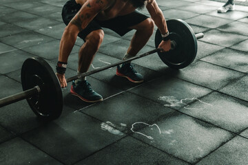 athlete training in the gym crossfit weights and body weight