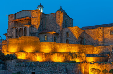 Qorikancha sun temple illuminated at night, Santo Domingo convent, Cusco, Peru.