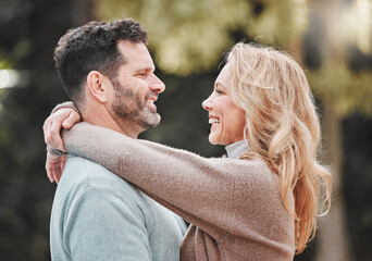 Obraz premium I look at you and Im home. Shot of an affectionate mature couple standing outside.