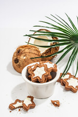 Gluten-free and lactose-free coconut cookies. Homemade healthy pastries, green tea, sunny morning