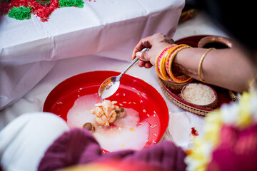 Indian Hindu wedding ceremony Ganesh pooja ritual items close up
