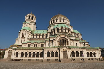 Fototapeta na wymiar The many windows and domes of the St. Alexander Nevsky Cathedral in Sofia